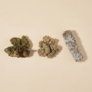 Repose and Tranquility CBD flower with a sage smudge stick