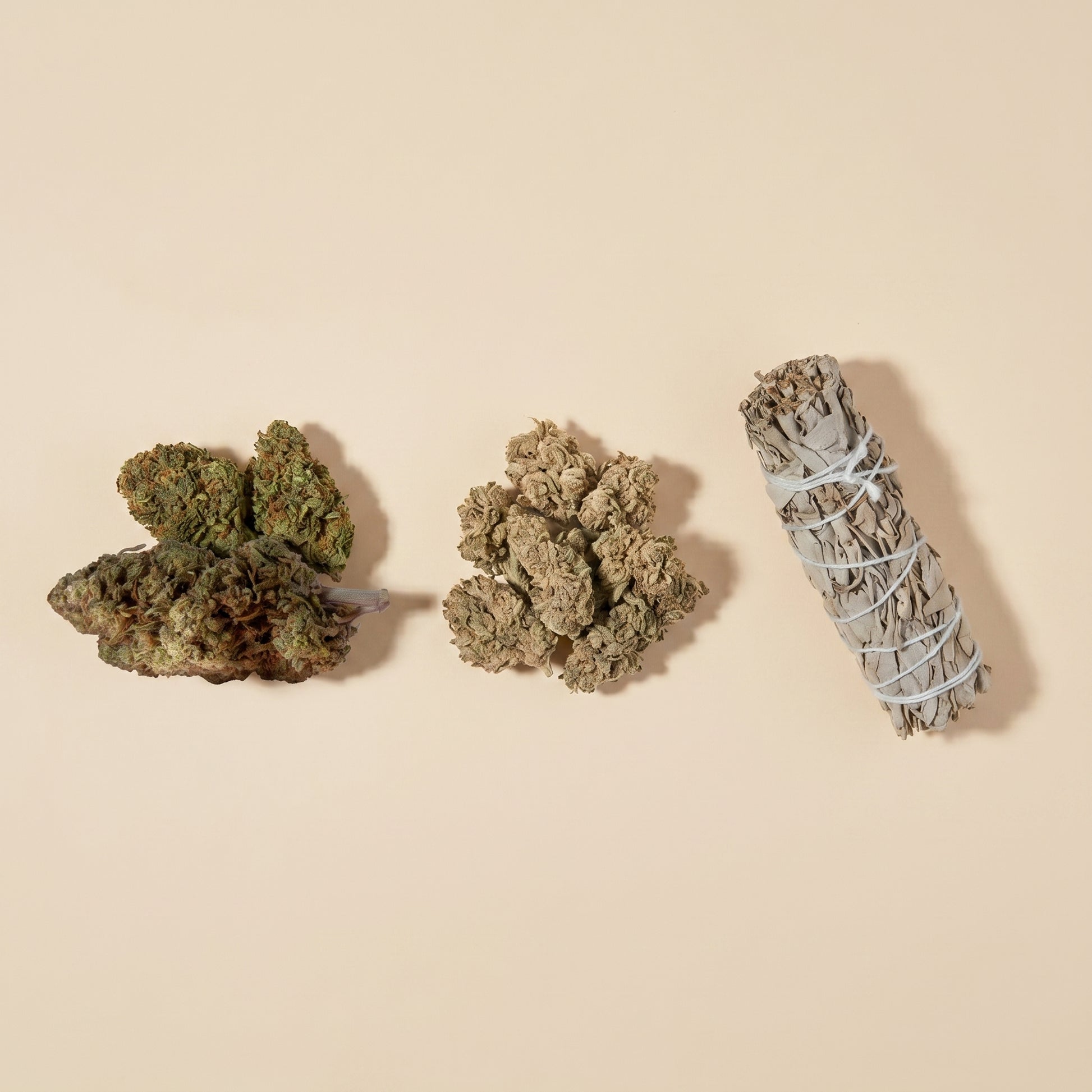 Repose and Tranquility CBD flower with a sage smudge stick