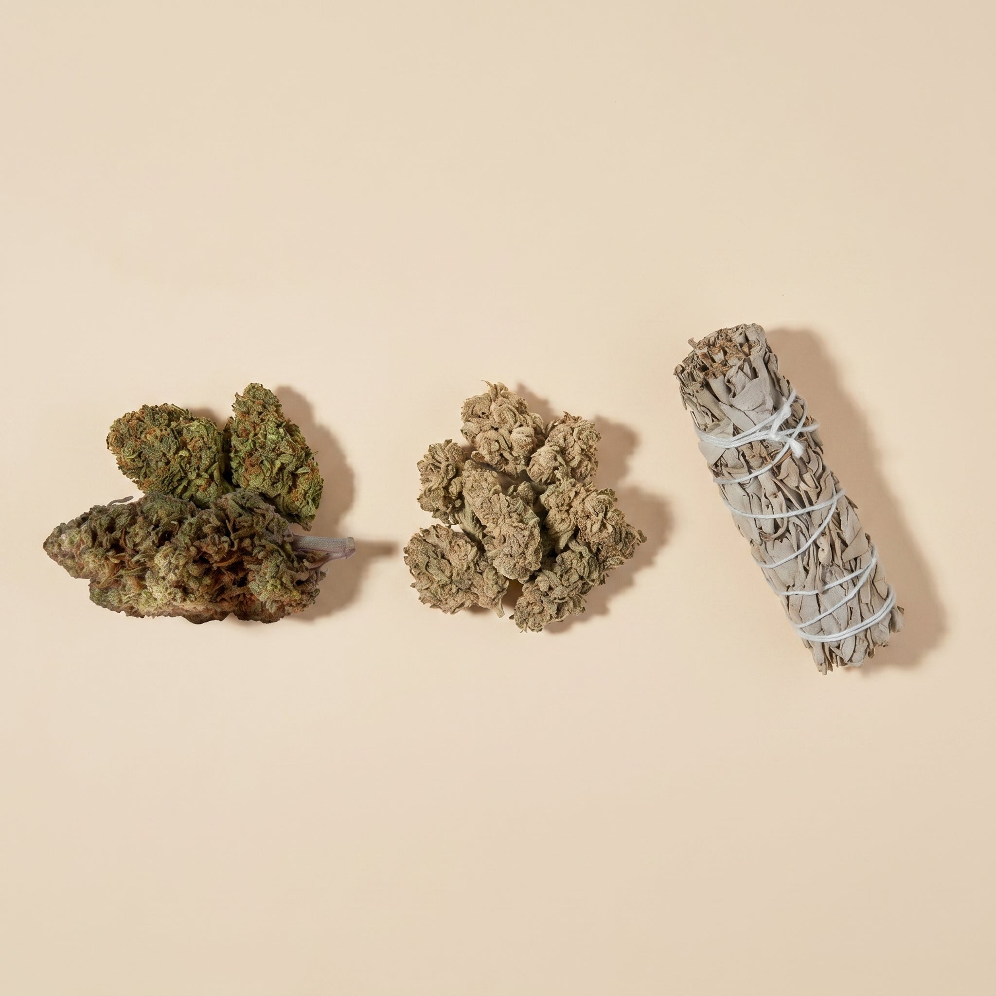 Repose and Tranquility CBD flower with a sage smudge stick